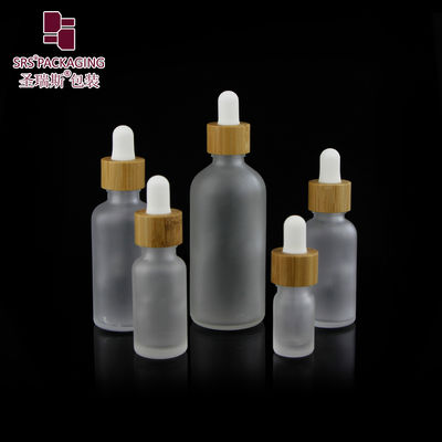 kaufen Custom Frosted Essential Oil Empty Packaging 15ml 30ml 50ml 100ml Bamboo Dropper Bottle Online-Herstellung